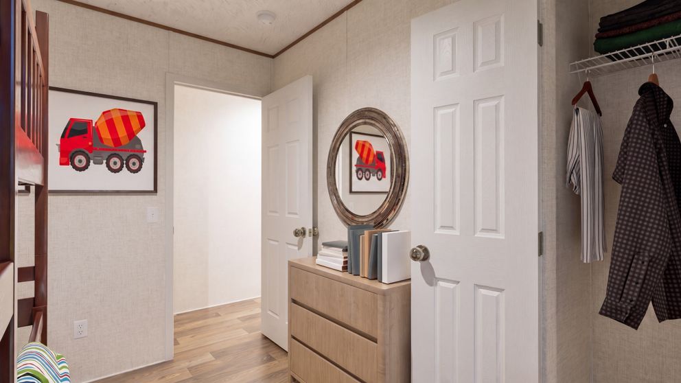 The CYPRESS Guest Bedroom. This Manufactured Mobile Home features 4 bedrooms and 2 baths.