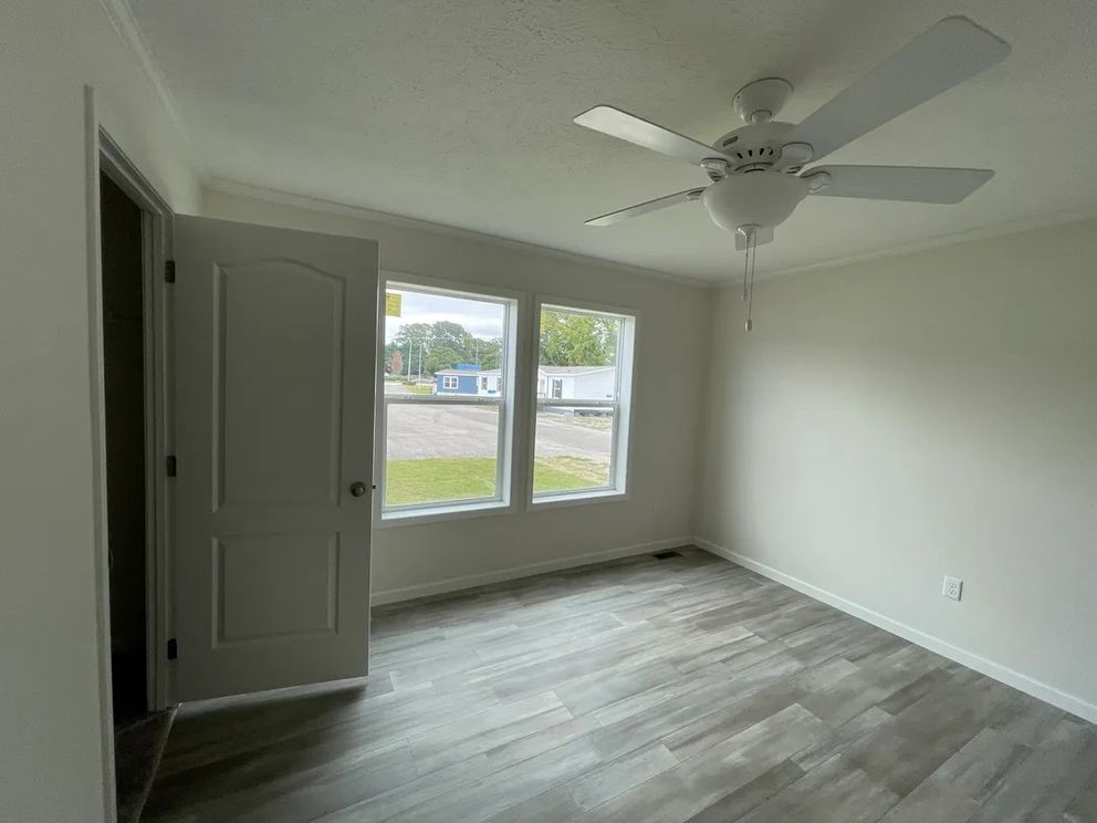 The MOONSTONE Primary Bedroom. This Manufactured Mobile Home features 3 bedrooms and 2 baths.