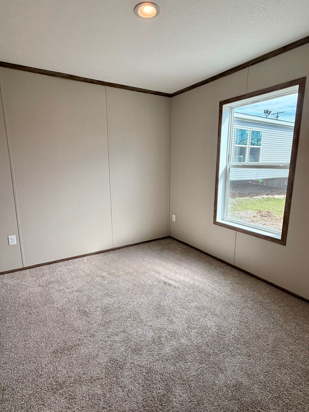 The APATITE Guest Bedroom. This Manufactured Mobile Home features 3 bedrooms and 2 baths.
