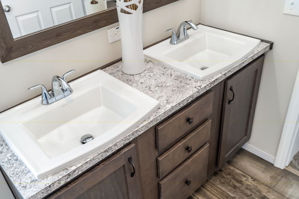 The CLASSIC 56D Master Bathroom. This Manufactured Mobile Home features 3 bedrooms and 2 baths.