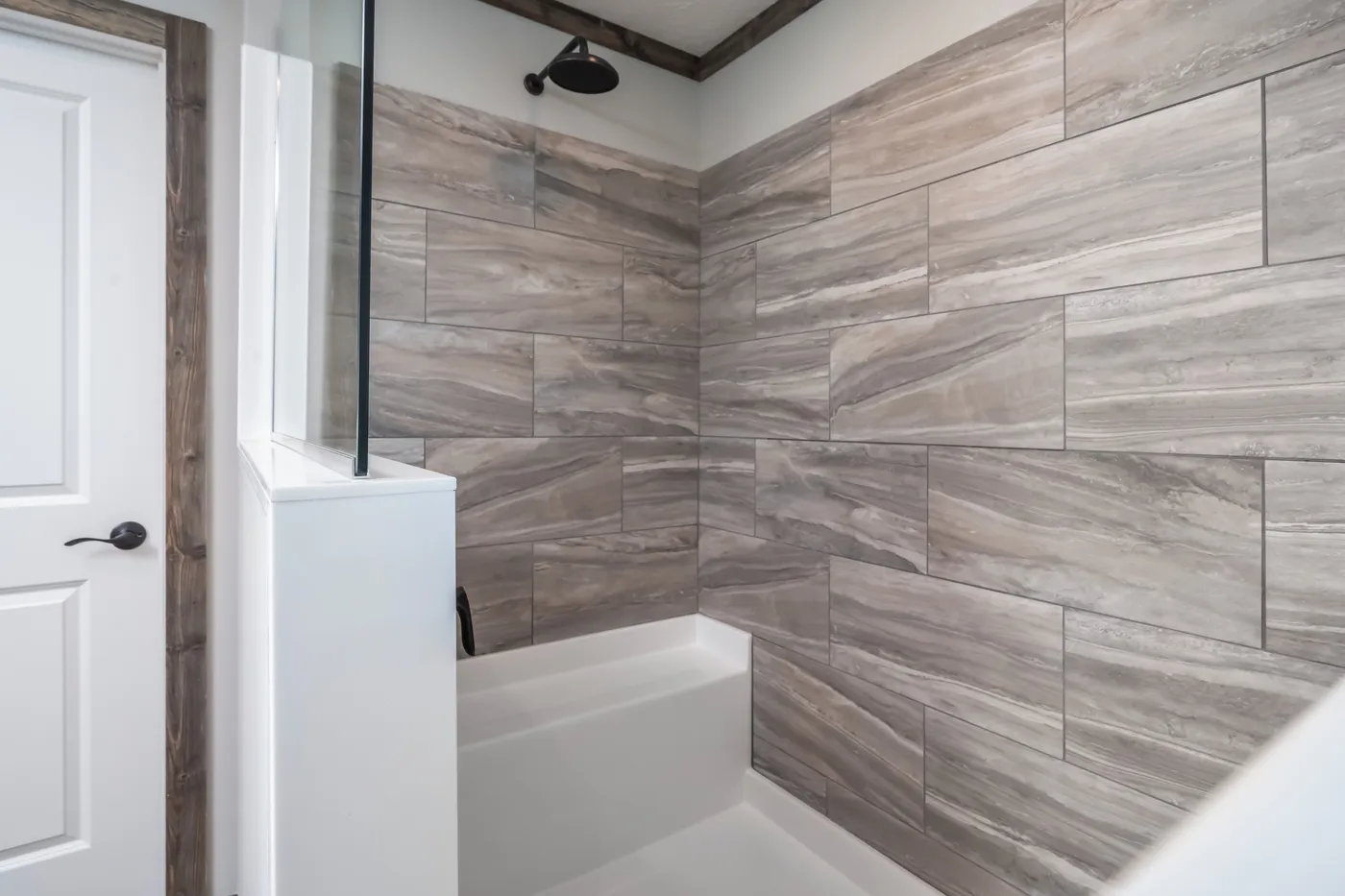 The THE JACKSON Primary Bathroom. This Manufactured Mobile Home features 4 bedrooms and 2 baths.