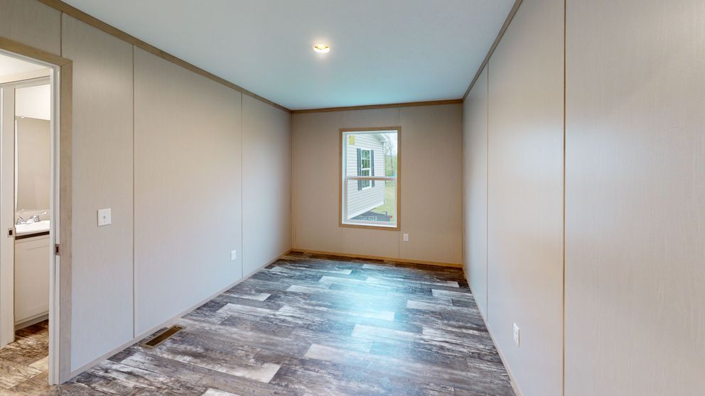 The FRANKLIN Guest Bedroom. This Manufactured Mobile Home features 3 bedrooms and 2 baths.