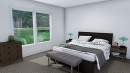 The LOVELY DAY Master Bedroom. This Manufactured Mobile Home features 4 bedrooms and 2 baths.