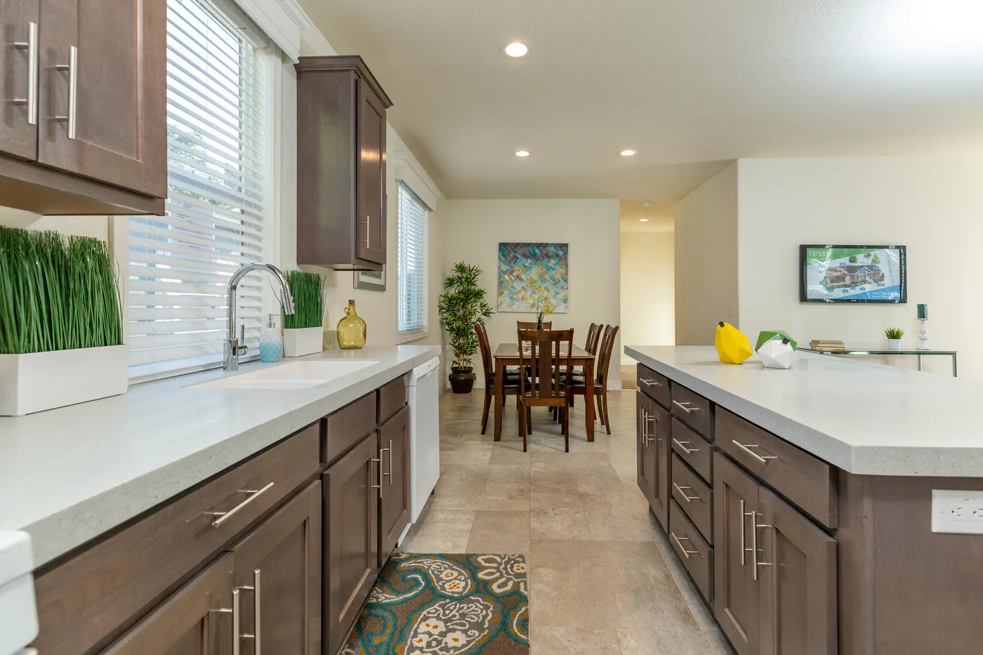 The FAIRPOINT 27543F Kitchen. This Manufactured Mobile Home features 3 bedrooms and 2 baths.