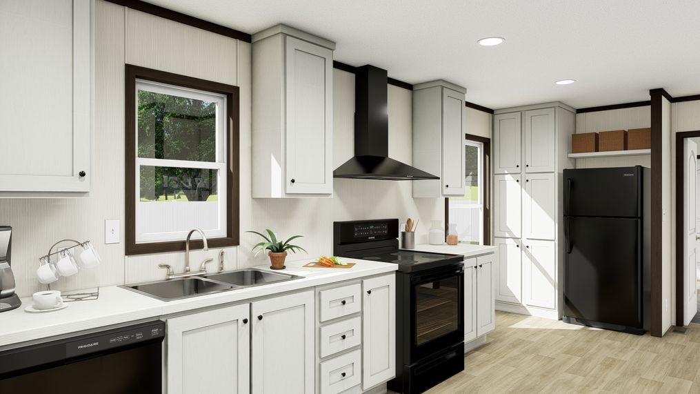 The THE GRAND Kitchen. This Manufactured Mobile Home features 3 bedrooms and 2 baths.