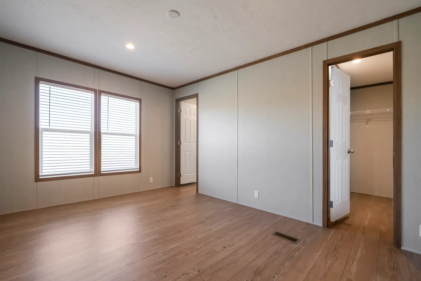 The SEAS THE DAY Bedroom. This Manufactured Mobile Home features 3 bedrooms and 2 baths.