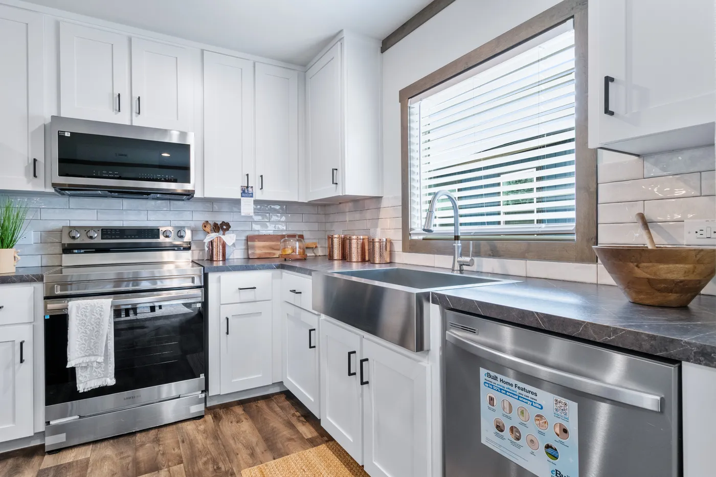 The SAWYER ELITE Kitchen. This Manufactured Mobile Home features 3 bedrooms and 2 baths.