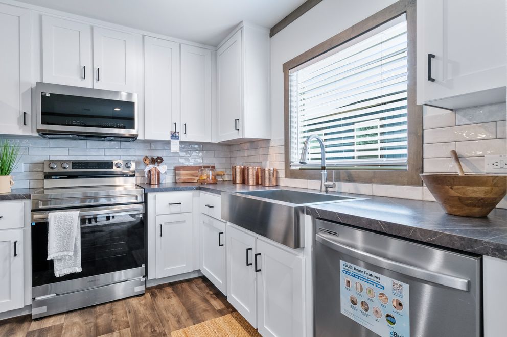 The SAWYER ELITE Kitchen. This Manufactured Mobile Home features 3 bedrooms and 2 baths.