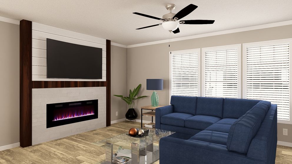 The THE BIG EASY Living Room. This Manufactured Mobile Home features 4 bedrooms and 3 baths.