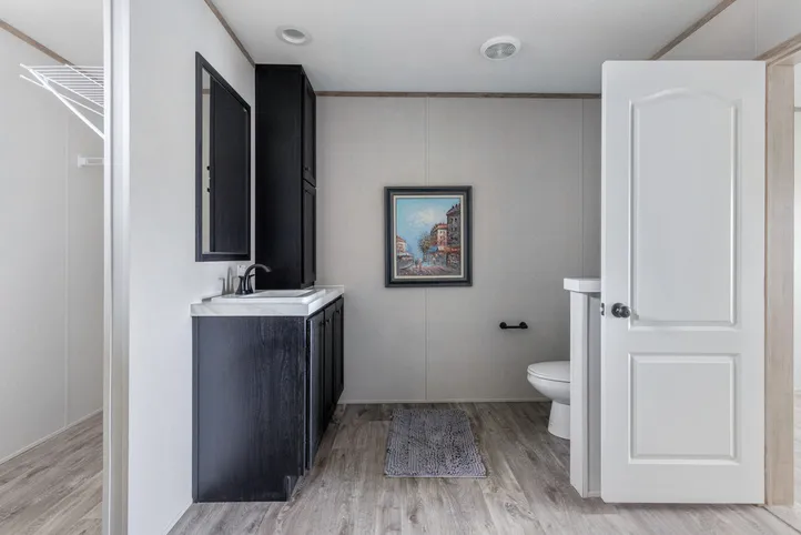The STERLING XL ANNIVERSARY Primary Bathroom. This Manufactured Mobile Home features 3 bedrooms and 2 baths.
