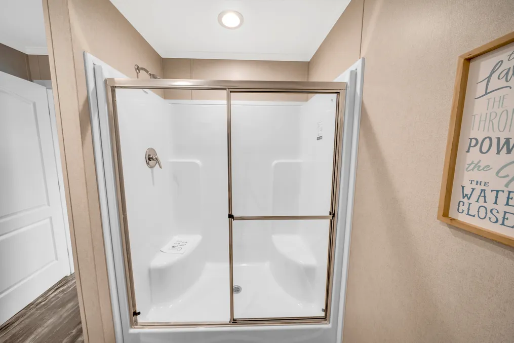 The SWEET BREEZE 76 Primary Bathroom. This Manufactured Mobile Home features 3 bedrooms and 2 baths.