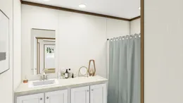 The OCCASSION Guest Bathroom. This Manufactured Mobile Home features 4 bedrooms and 2 baths.