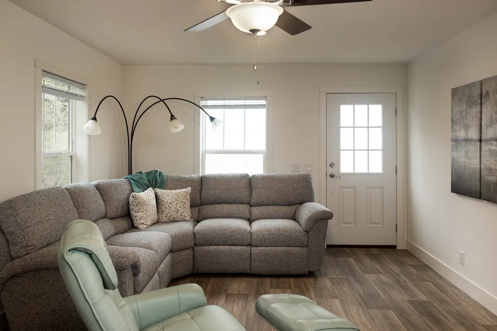 The HEY JUDE Living Room. This Manufactured Mobile Home features 4 bedrooms and 2 baths.