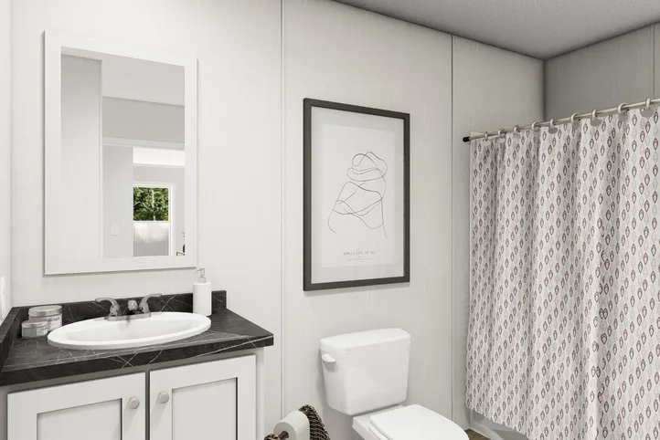 The JADE Guest Bathroom. This Manufactured Mobile Home features 2 bedrooms and 1 bath.