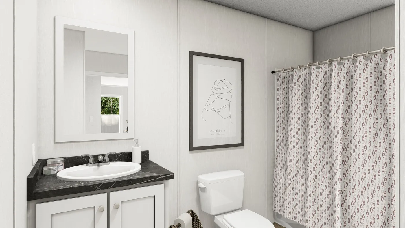 The JADE Guest Bathroom. This Manufactured Mobile Home features 2 bedrooms and 1 bath.