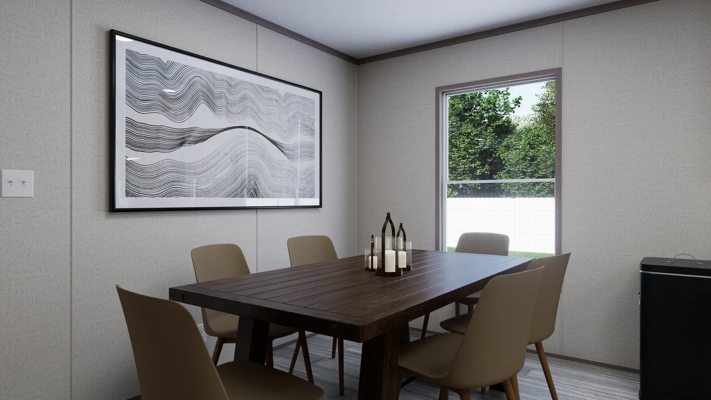 The THE MOUNTAINEER 60 Dining Area. This Manufactured Mobile Home features 3 bedrooms and 2 baths.