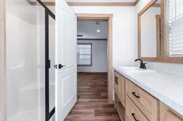 The TINSLEY Primary Bathroom. This Manufactured Mobile Home features 4 bedrooms and 2 baths.