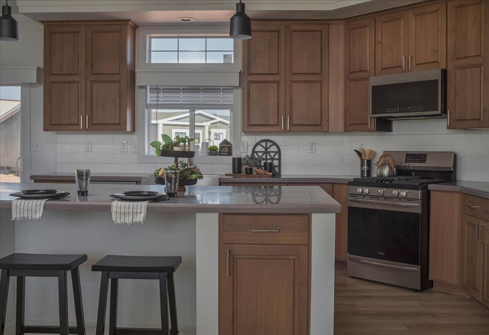 The TU3076A MEGA TUNDRA Kitchen. This Manufactured Mobile Home features 4 bedrooms and 2 baths.