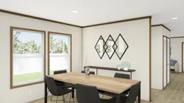 The AMBITION Dining Area. This Manufactured Mobile Home features 4 bedrooms and 2 baths.