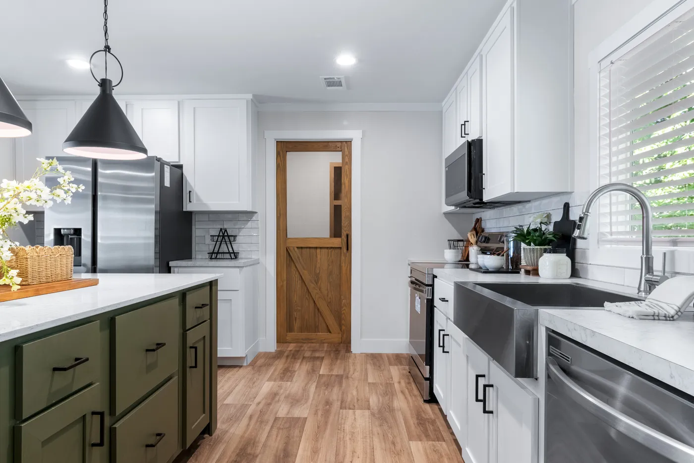 The FARM 4 FLEX ELITE Kitchen. This Manufactured Mobile Home features 4 bedrooms and 3 baths.