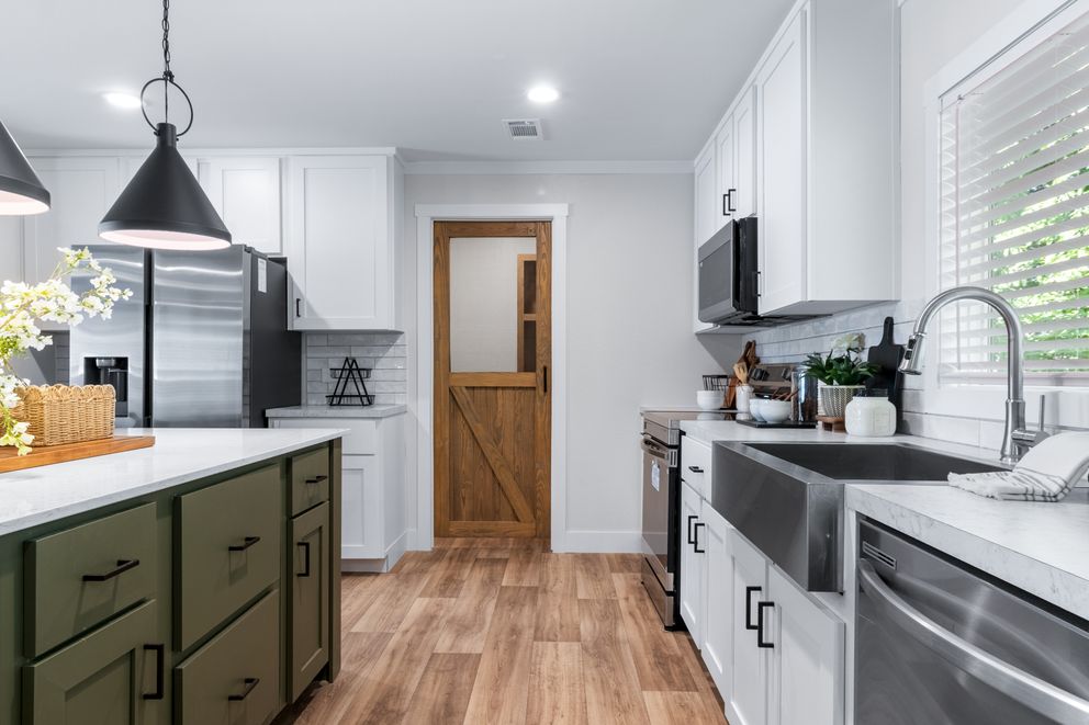 The FARM 4 FLEX ELITE Kitchen. This Manufactured Mobile Home features 4 bedrooms and 3 baths.