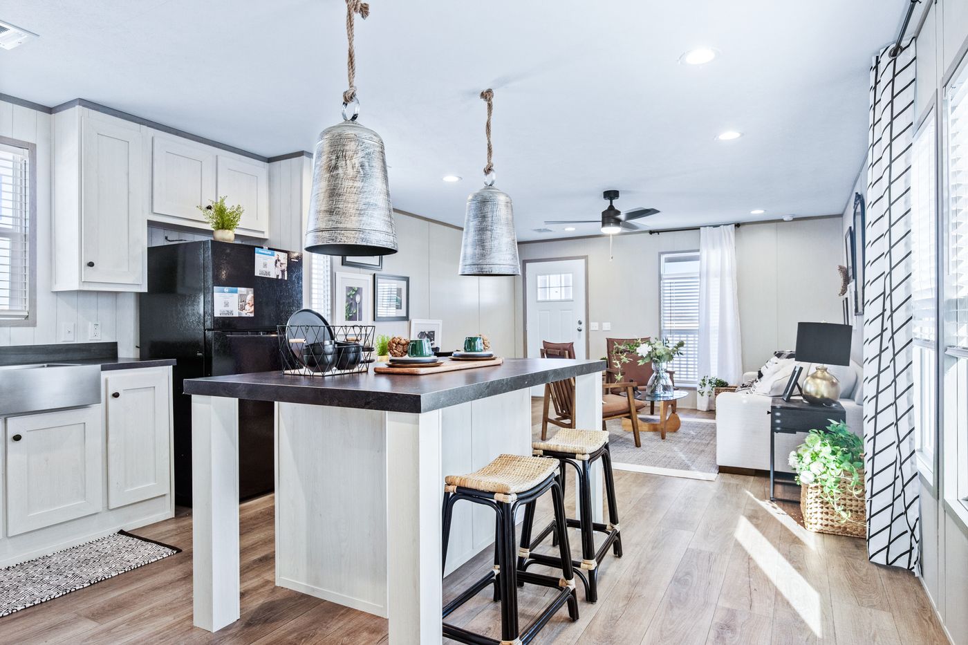 The PORCH LIVING SERIES 16682A Kitchen. This Manufactured Mobile Home features 2 bedrooms and 2 baths.