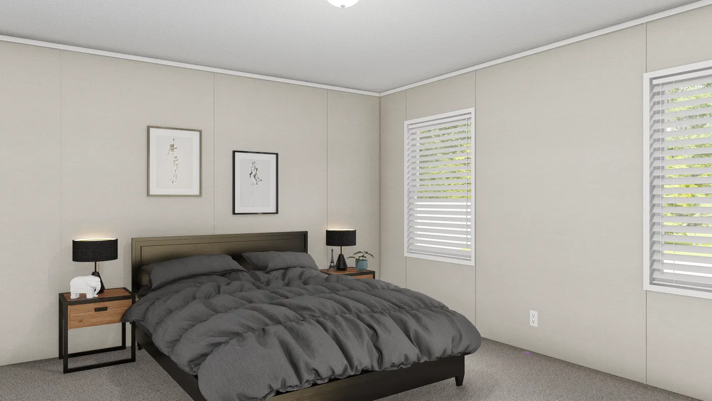 The ULTRA BREEZE 28X52 Primary Bedroom. This Manufactured Mobile Home features 3 bedrooms and 2 baths.