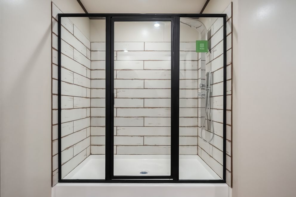 The MOUNTAIN VIEW Primary Bathroom. This Manufactured Mobile Home features 3 bedrooms and 2 baths.
