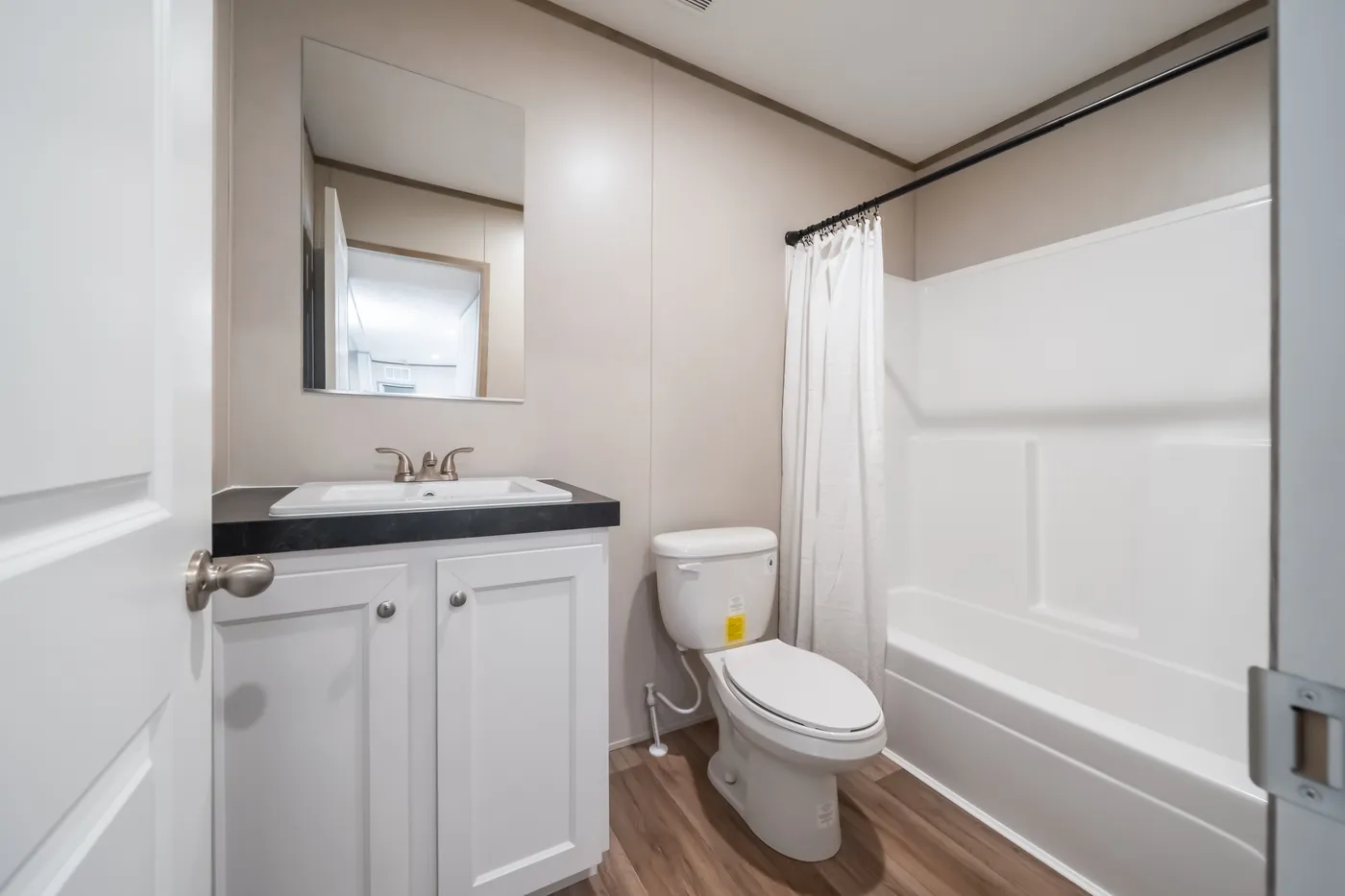 The VISTA Guest Bathroom. This Manufactured Mobile Home features 3 bedrooms and 2 baths.