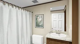 The SENSATION Guest Bathroom. This Manufactured Mobile Home features 3 bedrooms and 2 baths.