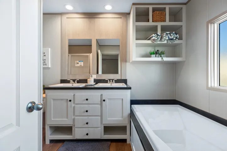 The RESOLUTION 16763X Primary Bathroom. This Manufactured Mobile Home features 3 bedrooms and 2 baths.