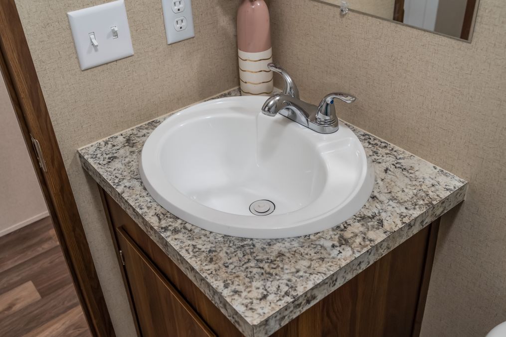 The ELATION Guest Bathroom. This Manufactured Mobile Home features 3 bedrooms and 2 baths.