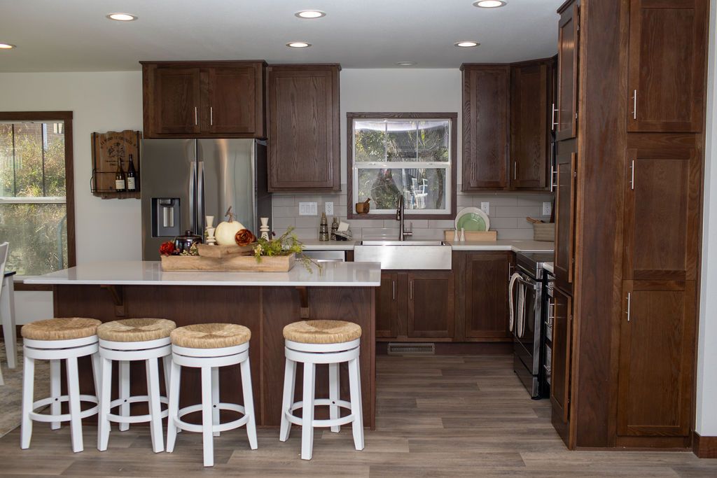 The LEGEND 76-4 Kitchen. This Manufactured Mobile Home features 3 bedrooms and 2 baths.