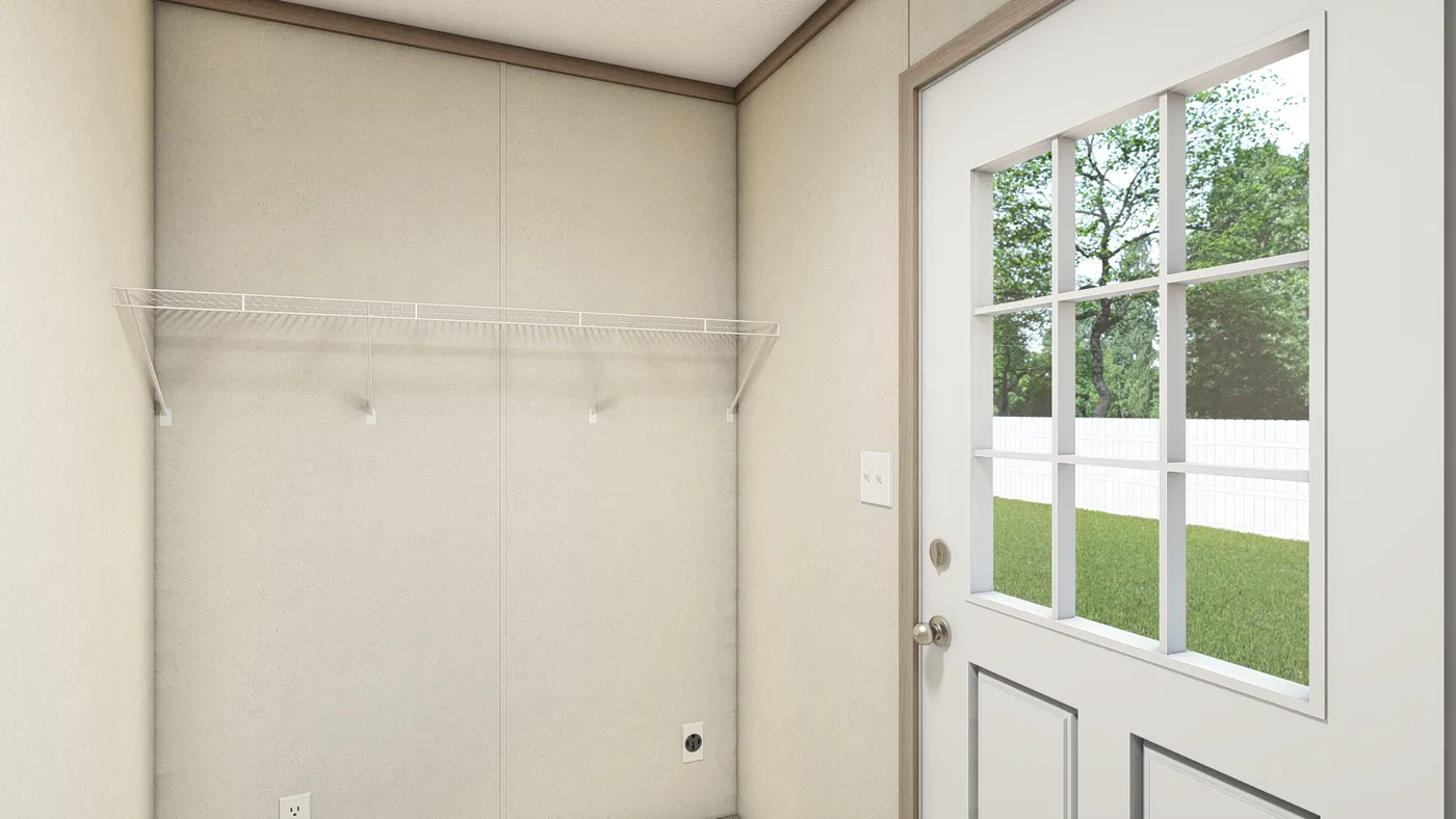 The 7616-4714 THE PULSE Utility Room. This Manufactured Mobile Home features 3 bedrooms and 2 baths.