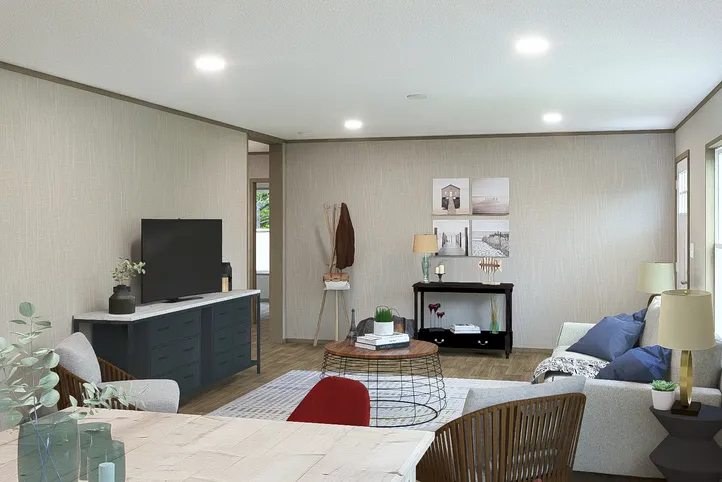The EVEREST Living Room. This Manufactured Mobile Home features 4 bedrooms and 2 baths.