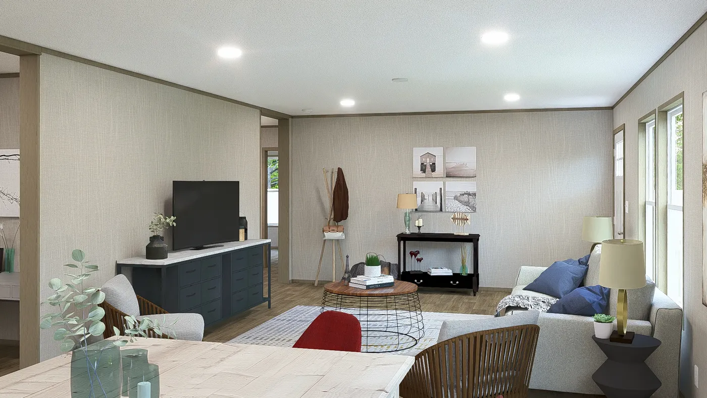 The EVEREST Living Room. This Manufactured Mobile Home features 4 bedrooms and 2 baths.