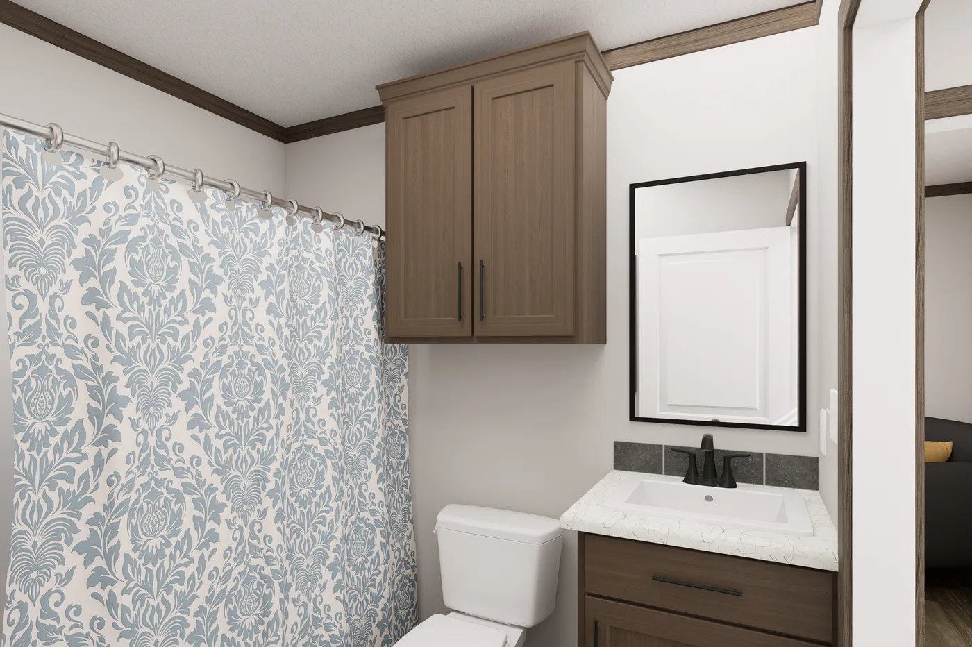 The THE TRUMAN Guest Bathroom. This Manufactured Mobile Home features 3 bedrooms and 2 baths.