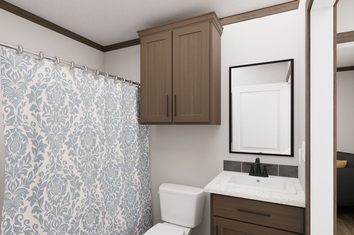 The THE TRUMAN Guest Bathroom. This Manufactured Mobile Home features 3 bedrooms and 2 baths.