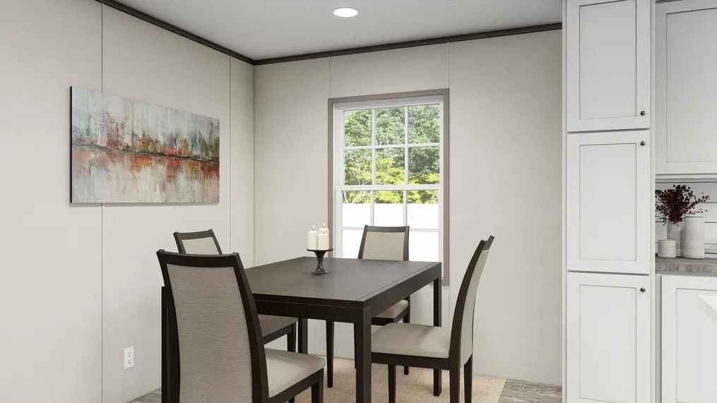 The ULTRA BREEZE 28X52 Dining Room. This Manufactured Mobile Home features 3 bedrooms and 2 baths.