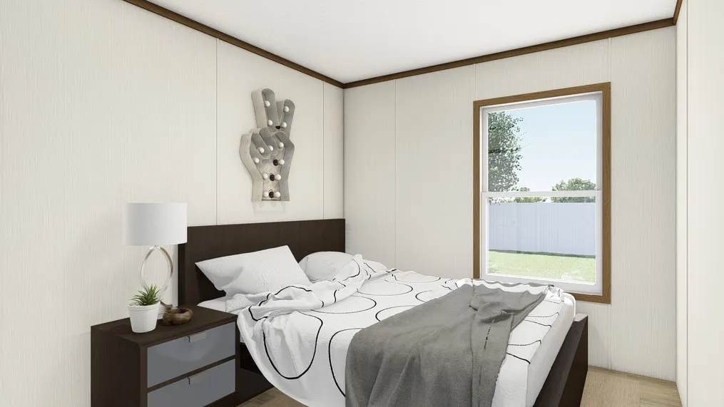 The THE REVEAL Bedroom. This Manufactured Mobile Home features 3 bedrooms and 2 baths.