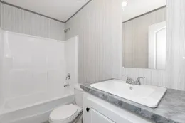 The BLAZER 66 F Guest Bathroom. This Manufactured Mobile Home features 3 bedrooms and 2 baths.