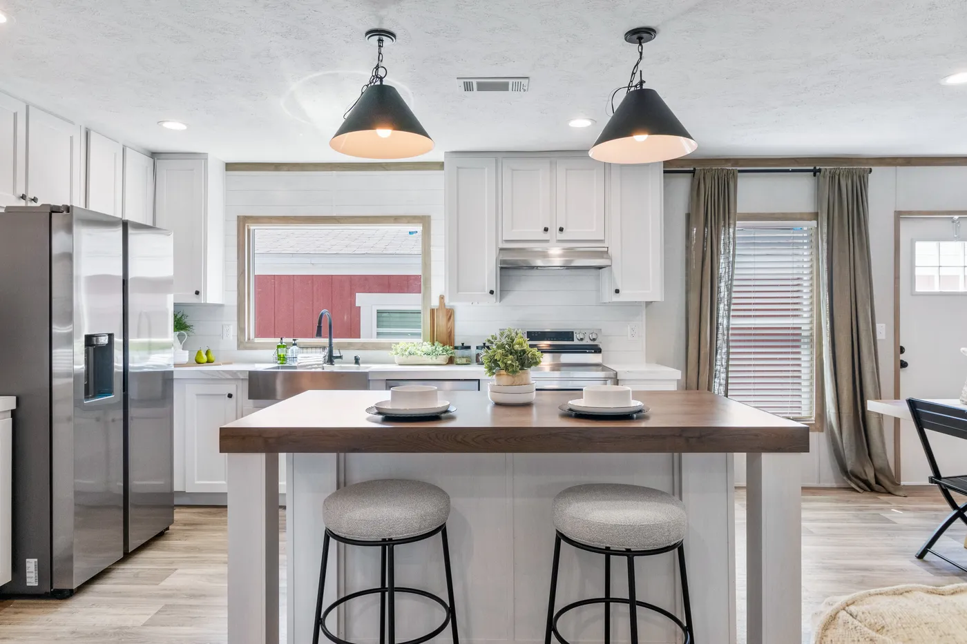 The THE REAL DEAL Kitchen. This Manufactured Mobile Home features 3 bedrooms and 2 baths.