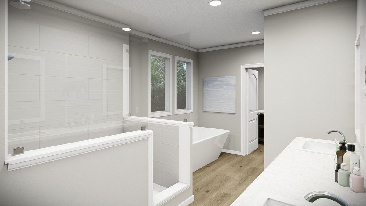 The HUXTON II Primary Bathroom. This Manufactured Mobile Home features 4 bedrooms and 2 baths.