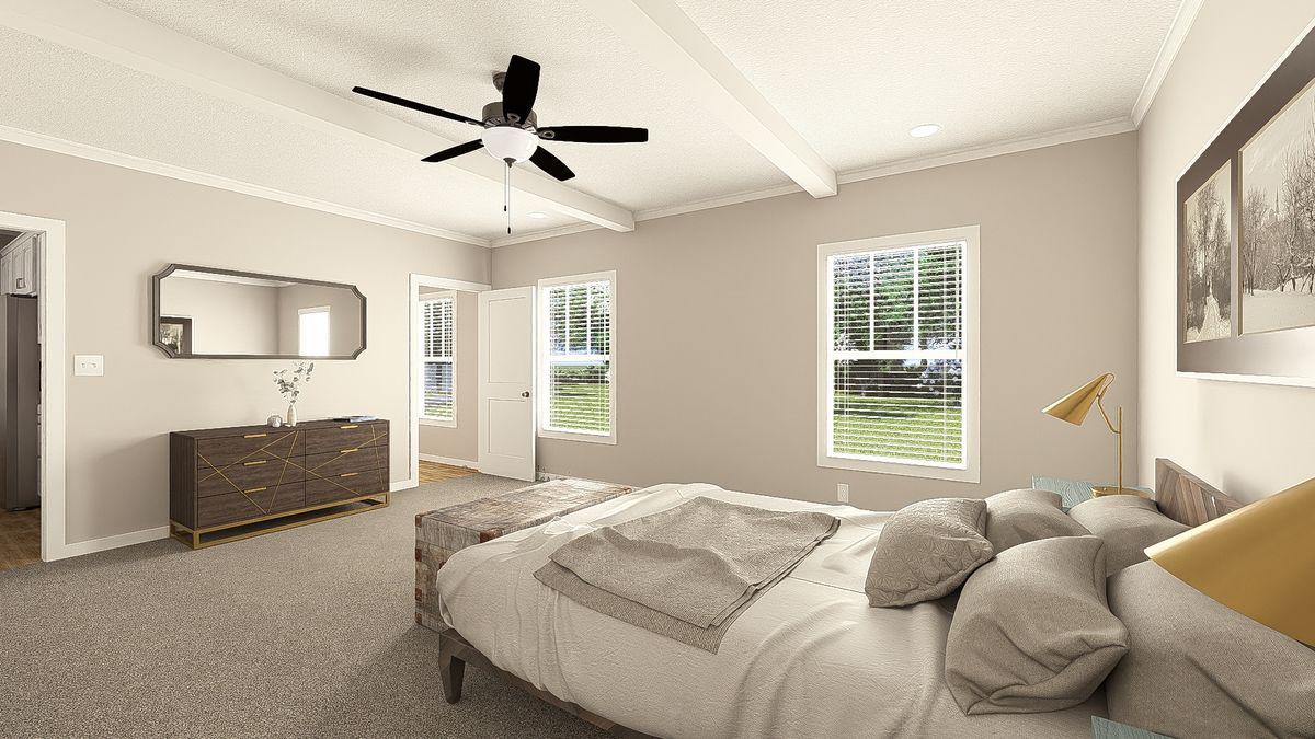 The THE HEXAGON Primary Bedroom. This Manufactured Mobile Home features 4 bedrooms and 3 baths.