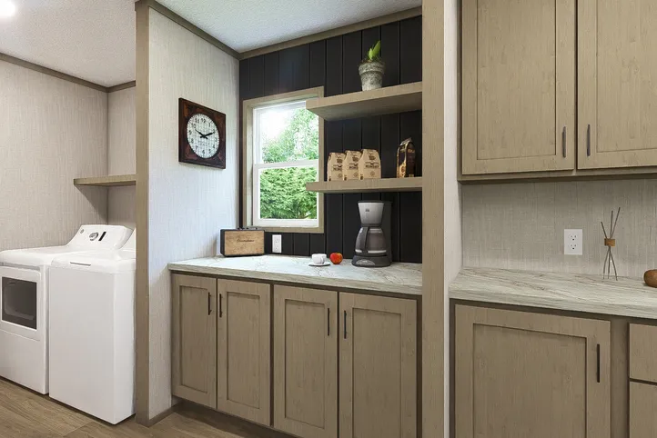 The RIO Utility Room. This Manufactured Mobile Home features 3 bedrooms and 2 baths.