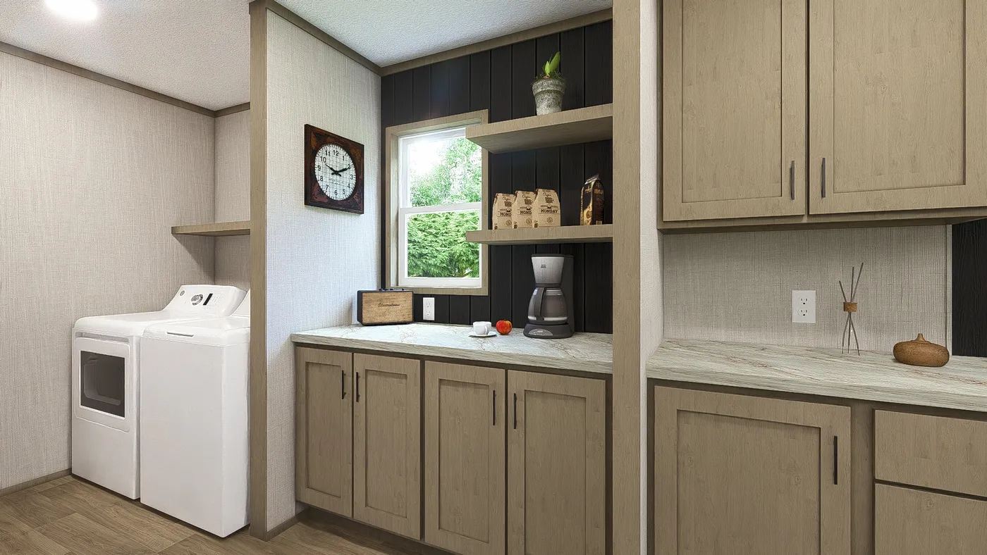 The RIO Utility Room. This Manufactured Mobile Home features 3 bedrooms and 2 baths.
