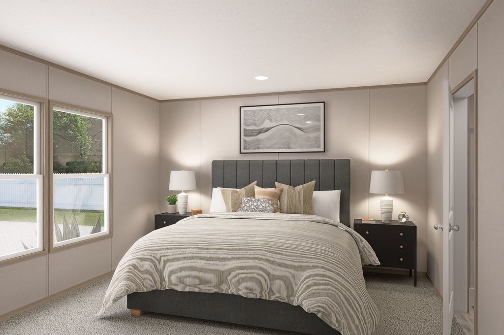 The THE EAGLE 68 Primary Bedroom. This Manufactured Mobile Home features 4 bedrooms and 2 baths.