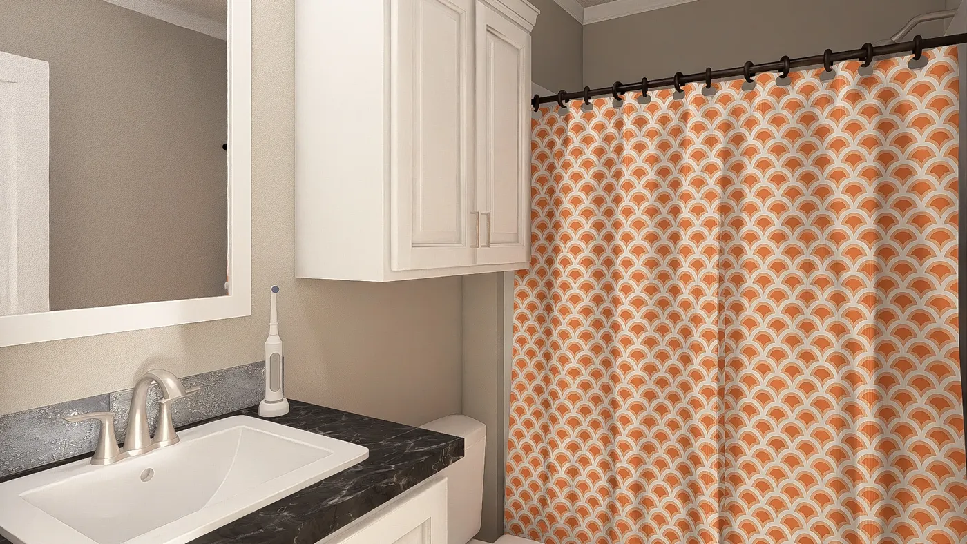 The THE BIG EASY Guest Bathroom. This Manufactured Mobile Home features 4 bedrooms and 3 baths.