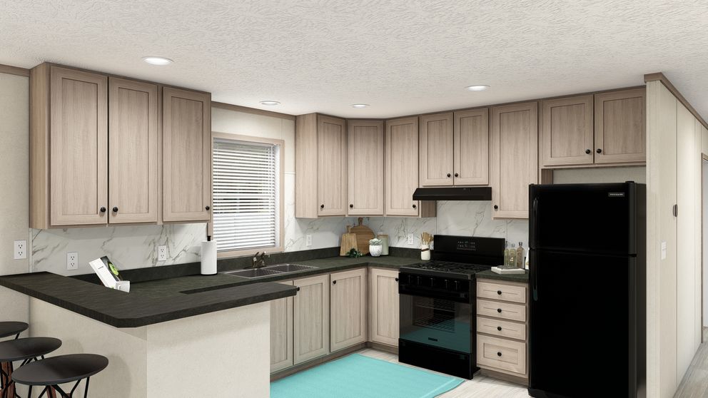 The 7616-4773P THE PULSE Kitchen. This Manufactured Mobile Home features 3 bedrooms and 2 baths.