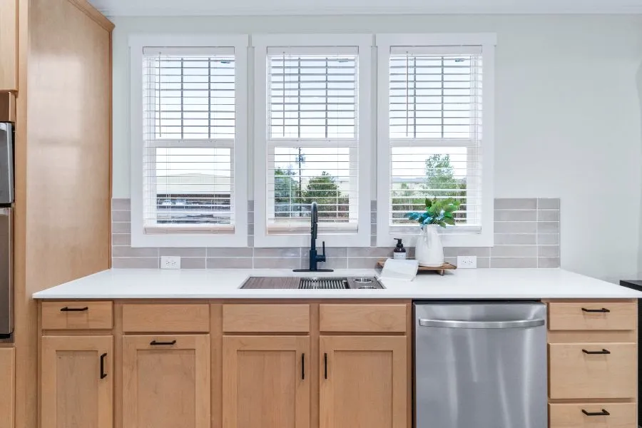 The THE ARCHIBALD Kitchen. This Manufactured Mobile Home features 4 bedrooms and 2 baths.